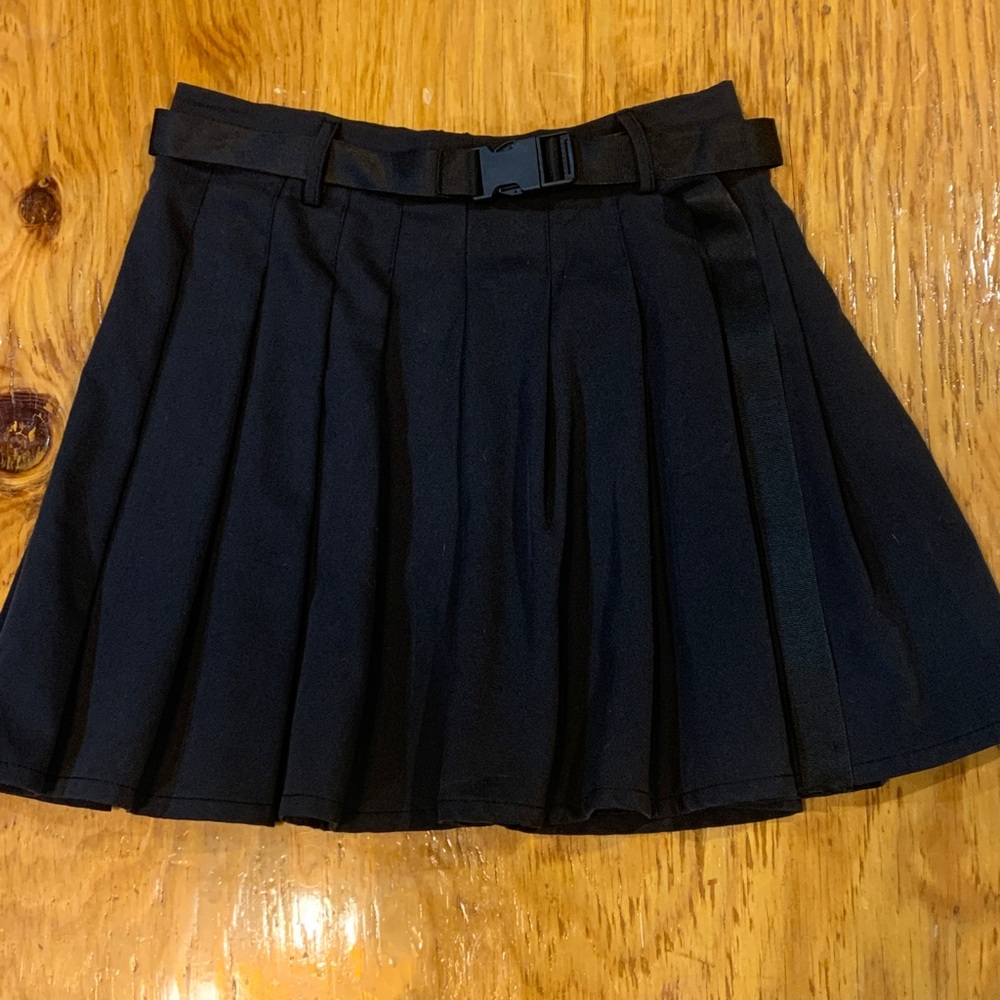 Black pleated skirt by Shein. XS